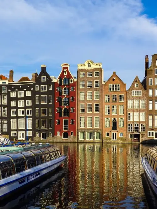 Canal houses and boats in Amsterdam