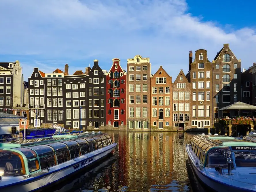 Canal houses and boats in Amsterdam