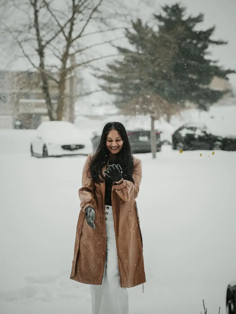 Rojina smiling in the snow in Finland
