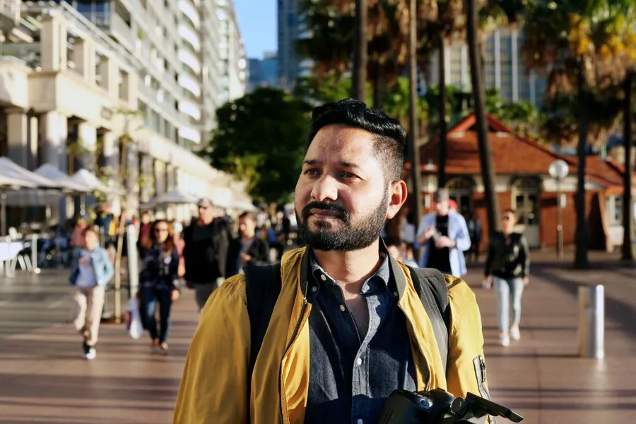 Bikash on a busy street in Sydney, Australia