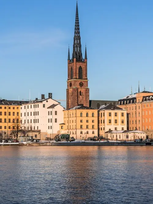 Stockholm's old town waterfront at golden hour